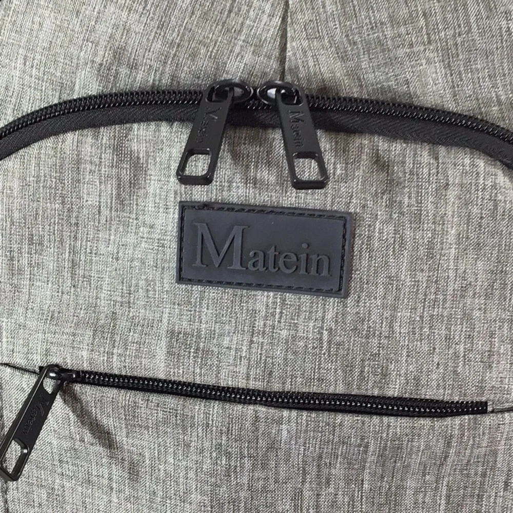 Matein gray fabric multi pocket backpack NWOT